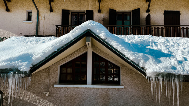 House With Snow On Roof